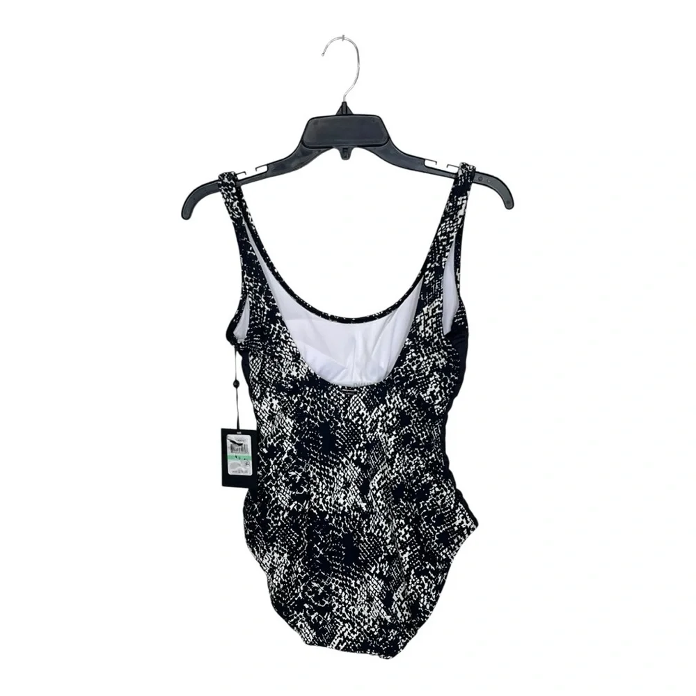 NWT DKNY | Mesh Side Inserts Ruched Waist One Piece
Swimsuit Size 8 - Picture 5 of 11